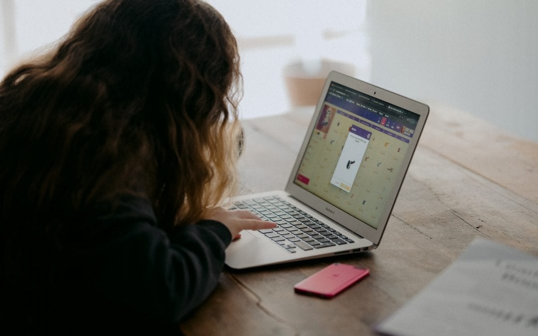 child working at computer