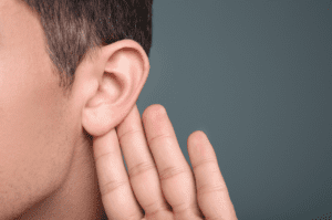 hand next to ear
